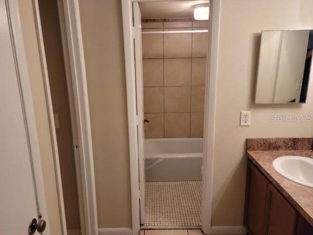 4322 Lakeway Dr Unit 13F, Orlando, FL 32839 - bathroom with vanity, bathing tub / shower combination, and tile patterned floors
