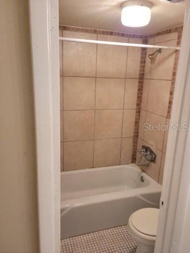 4322 Lakeway Dr Unit 13F, Orlando, FL 32839 - bathroom featuring tile patterned floors and shower / bath combination