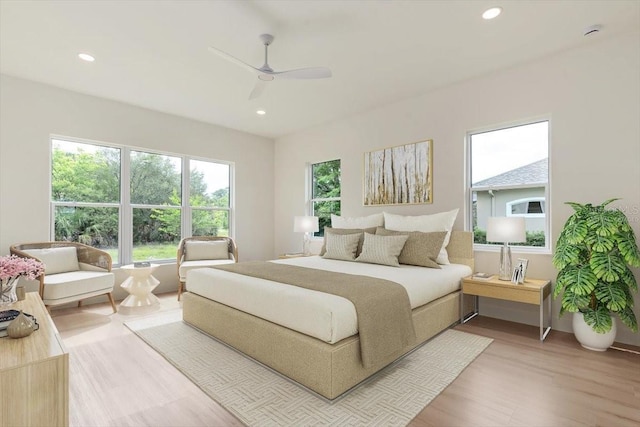 17 Old Oak Dr N, Palm Coast, FL 32137 - bedroom featuring recessed lighting, light wood-type flooring, and a ceiling fan