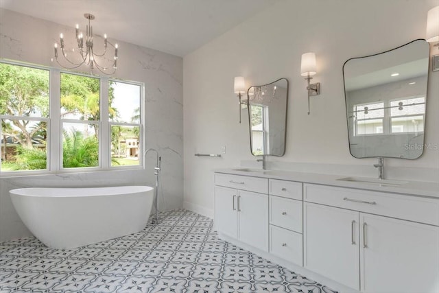 17 Old Oak Dr N, Palm Coast, FL 32137 - full bath with plenty of natural light, a soaking tub, and double vanity