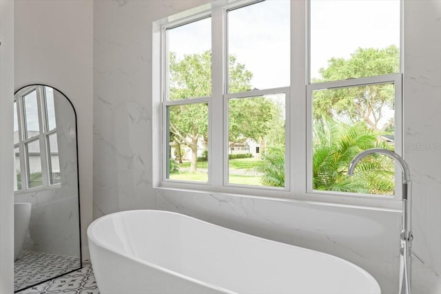 17 Old Oak Dr N, Palm Coast, FL 32137 - bathroom with a freestanding tub