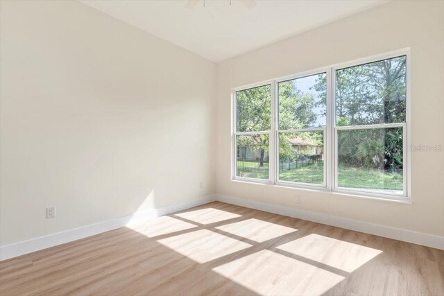 17 Old Oak Dr N, Palm Coast, FL 32137 - unfurnished room featuring healthy amount of natural light and wood finished floors