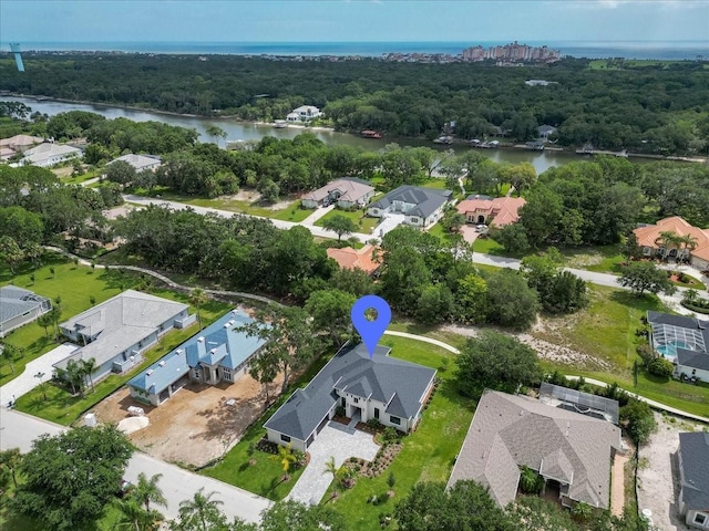 17 Old Oak Dr N, Palm Coast, FL 32137 - aerial overview of property's location with a large body of water and nearby suburban area