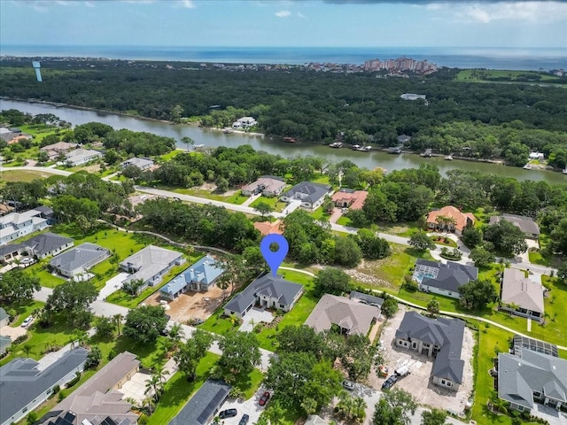 17 Old Oak Dr N, Palm Coast, FL 32137 - aerial view of property's location with a nearby body of water and nearby suburban area