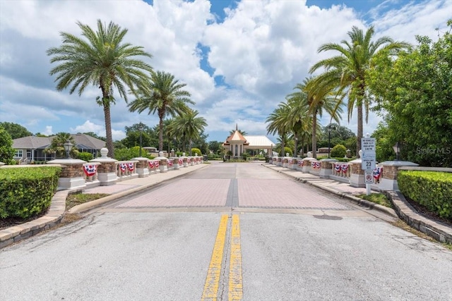 17 Old Oak Dr N, Palm Coast, FL 32137 - view of asphalt street featuring curbs, traffic signs, and sidewalks