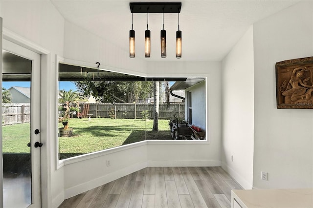 960 Falls Trl, Malabar, FL 32950 - unfurnished sunroom featuring healthy amount of natural light and french doors