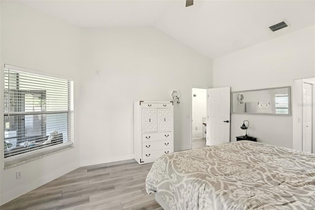 960 Falls Trl, Malabar, FL 32950 - bedroom with high vaulted ceiling, light wood-style floors, and a ceiling fan