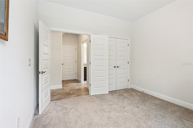 1833 Benoit Ter, Davenport, FL 33837 - unfurnished bedroom featuring carpet and a closet