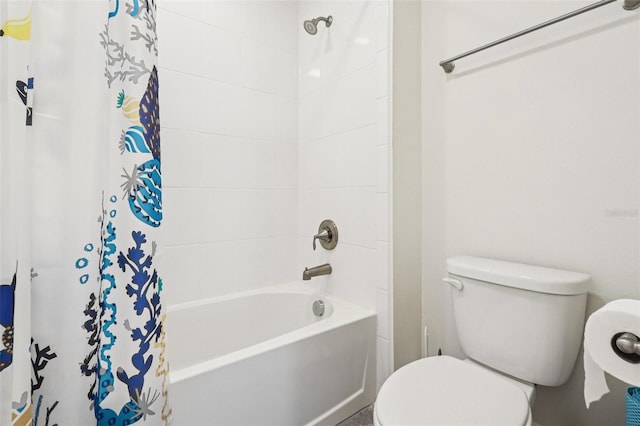 1833 Benoit Ter, Davenport, FL 33837 - full bath featuring shower / bath combo with shower curtain and toilet