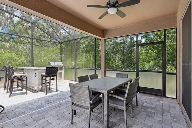 1833 Benoit Ter, Davenport, FL 33837 - sunroom with ceiling fan, area for grilling, and plenty of natural light