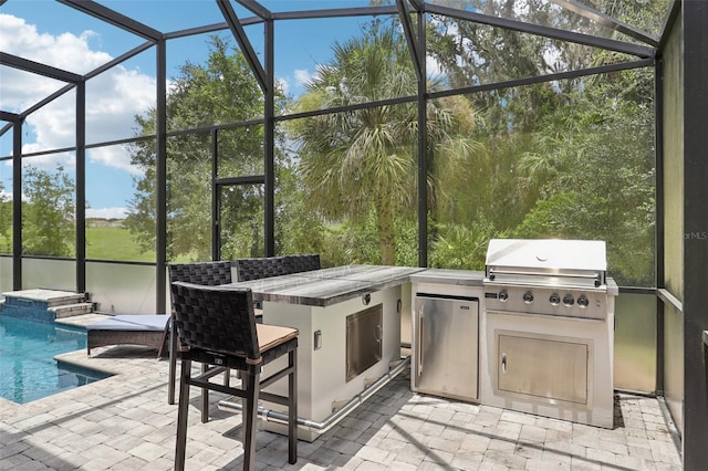 1833 Benoit Ter, Davenport, FL 33837 - view of patio / terrace featuring area for grilling, glass enclosure, and an outdoor pool