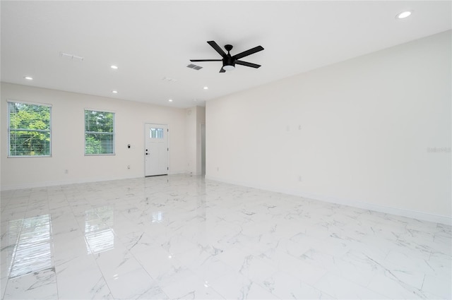 1157 W Hancock Dr, Deltona, FL 32725 - empty room featuring recessed lighting, a ceiling fan, and light marble finish flooring