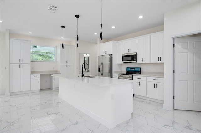 1157 W Hancock Dr, Deltona, FL 32725 - kitchen featuring stainless steel appliances, light marble finish floors, a kitchen island with sink, white cabinets, and recessed lighting