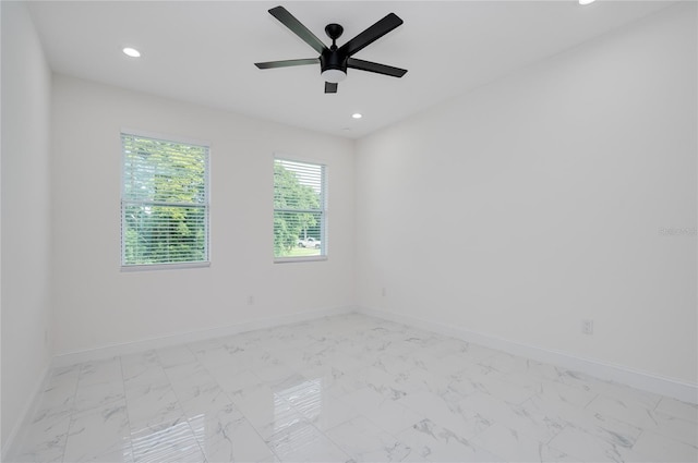 1157 W Hancock Dr, Deltona, FL 32725 - unfurnished room featuring recessed lighting, light marble finish floors, and a ceiling fan