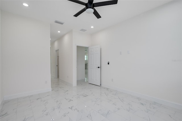 1157 W Hancock Dr, Deltona, FL 32725 - unfurnished room with a ceiling fan, recessed lighting, and light marble finish flooring