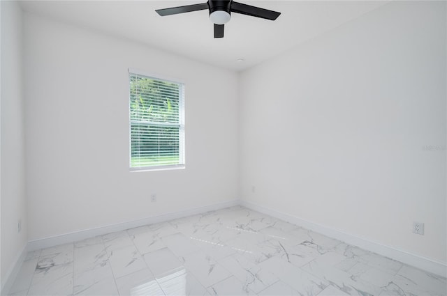 1157 W Hancock Dr, Deltona, FL 32725 - unfurnished room with light marble finish flooring and ceiling fan
