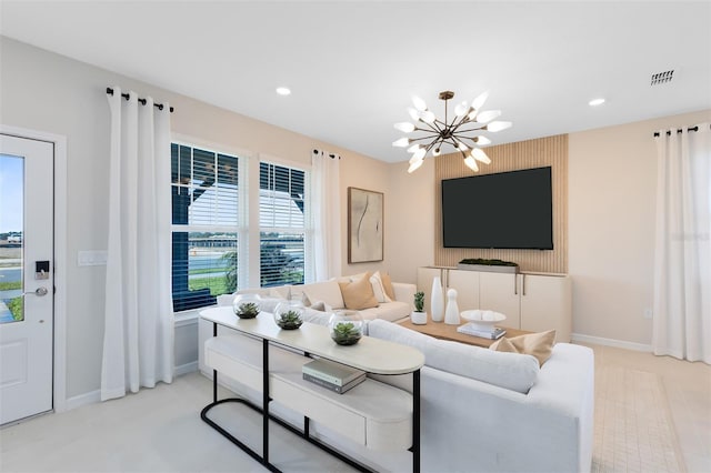 2302 Southbury Dr, Kissimmee, FL 34744 - living room with a chandelier and recessed lighting