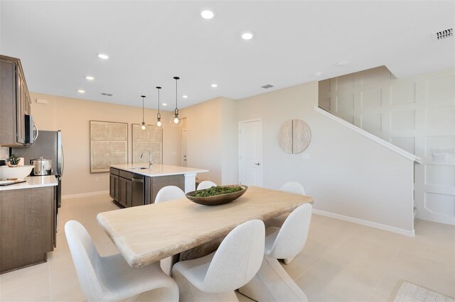 2302 Southbury Dr, Kissimmee, FL 34744 - dining area featuring recessed lighting and baseboards