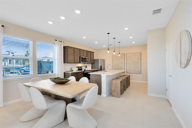 2302 Southbury Dr, Kissimmee, FL 34744 - dining room featuring recessed lighting