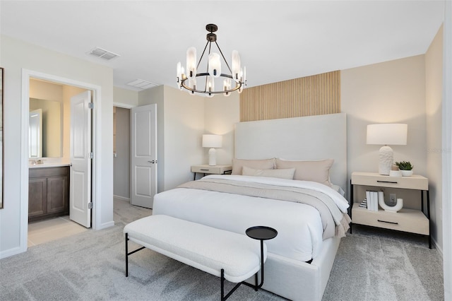 2302 Southbury Dr, Kissimmee, FL 34744 - bedroom with light carpet, a chandelier, and ensuite bath