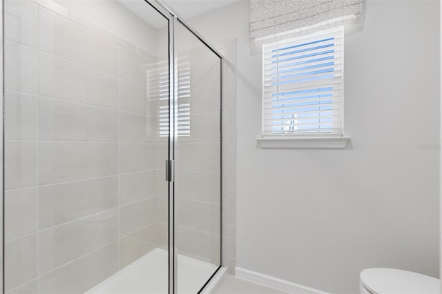 2302 Southbury Dr, Kissimmee, FL 34744 - bathroom with a shower stall and toilet