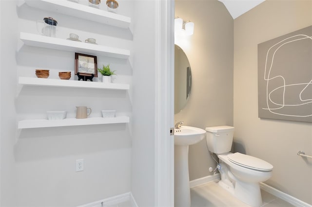 2302 Southbury Dr, Kissimmee, FL 34744 - half bath featuring toilet and baseboards