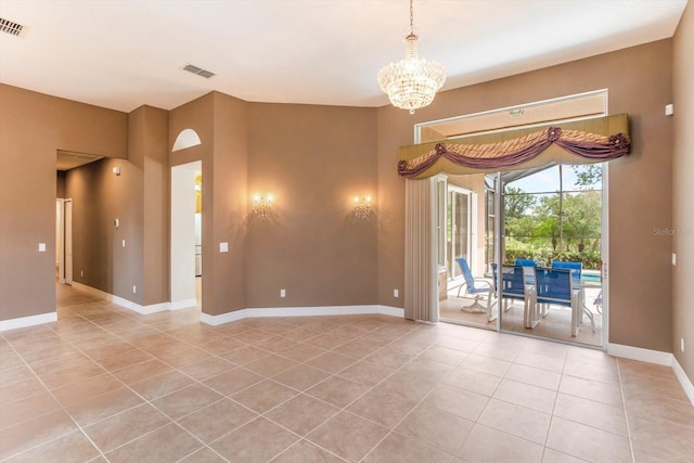 4216 Fawn Meadows Cir, Clermont, FL 34711 - unfurnished room featuring light tile patterned floors and a chandelier