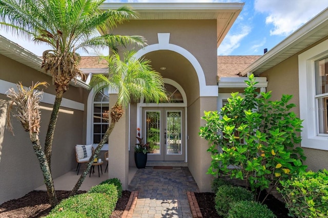 4216 Fawn Meadows Cir, Clermont, FL 34711 - entrance to property with french doors and stucco siding