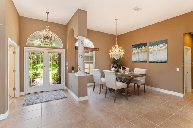 4216 Fawn Meadows Cir, Clermont, FL 34711 - foyer entrance with a chandelier, healthy amount of natural light, and light tile patterned flooring