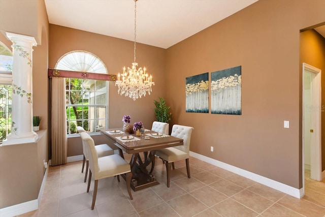 4216 Fawn Meadows Cir, Clermont, FL 34711 - dining space with plenty of natural light, ornate columns, light tile patterned flooring, and a chandelier