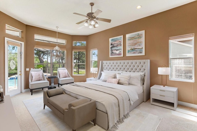 4216 Fawn Meadows Cir, Clermont, FL 34711 - bedroom with light carpet, access to outside, a chandelier, ceiling fan, and recessed lighting