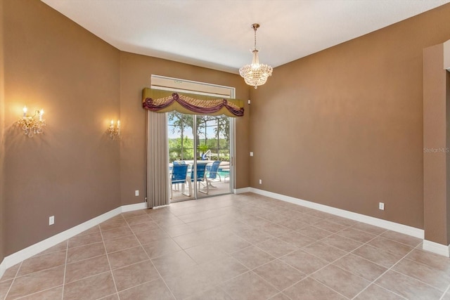 4216 Fawn Meadows Cir, Clermont, FL 34711 - empty room featuring a chandelier and light tile patterned floors