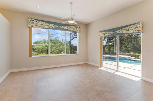 4216 Fawn Meadows Cir, Clermont, FL 34711 - empty room with ceiling fan, tile patterned floors, and recessed lighting
