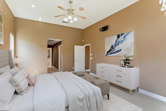 4216 Fawn Meadows Cir, Clermont, FL 34711 - bedroom with light carpet, recessed lighting, ensuite bath, and ceiling fan