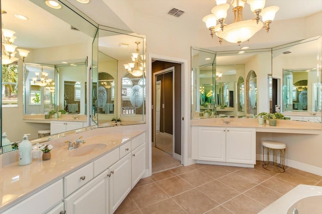 4216 Fawn Meadows Cir, Clermont, FL 34711 - full bath with a chandelier, tile patterned flooring, and two vanities