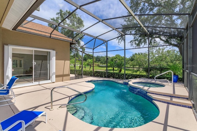 4216 Fawn Meadows Cir, Clermont, FL 34711 - view of swimming pool with a patio area, a pool with connected hot tub, a lanai, and view of wooded area