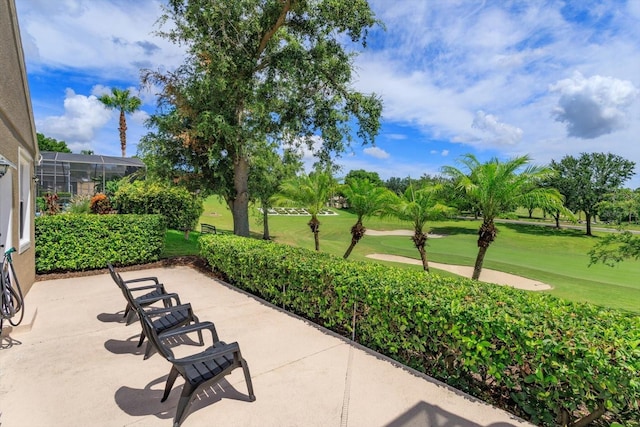 4216 Fawn Meadows Cir, Clermont, FL 34711 - view of community with view of golf course, a yard, and a patio