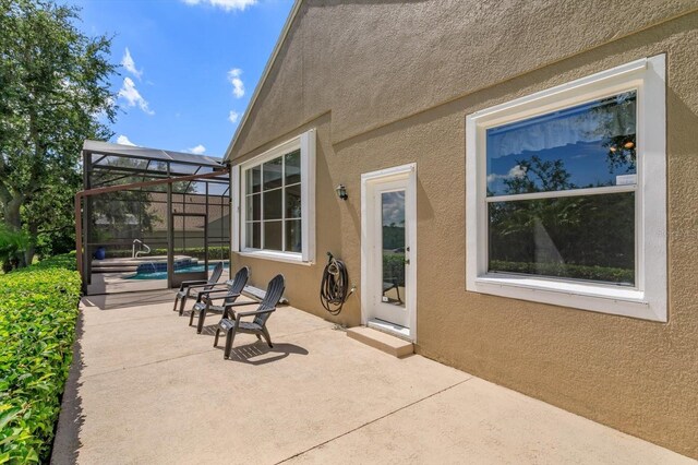 4216 Fawn Meadows Cir, Clermont, FL 34711 - view of patio / terrace featuring an outdoor pool and a lanai