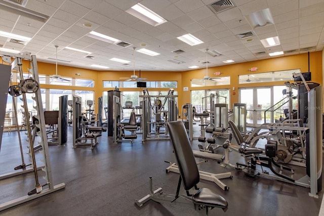 4216 Fawn Meadows Cir, Clermont, FL 34711 - gym with a paneled ceiling and ceiling fan