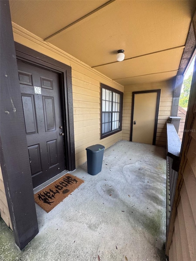 320 Forestway Cir Unit 203, Altamonte Springs, FL 32701 - property entrance featuring concrete block siding