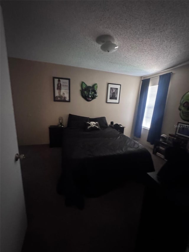 320 Forestway Cir Unit 203, Altamonte Springs, FL 32701 - bedroom with a textured ceiling