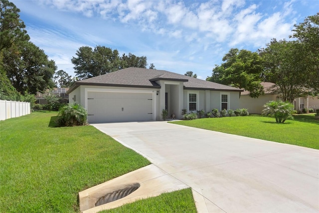 69 Pin Oak Dr, Palm Coast, FL 32164 - view of front of home with an attached garage, stucco siding, concrete driveway, and a shingled roof