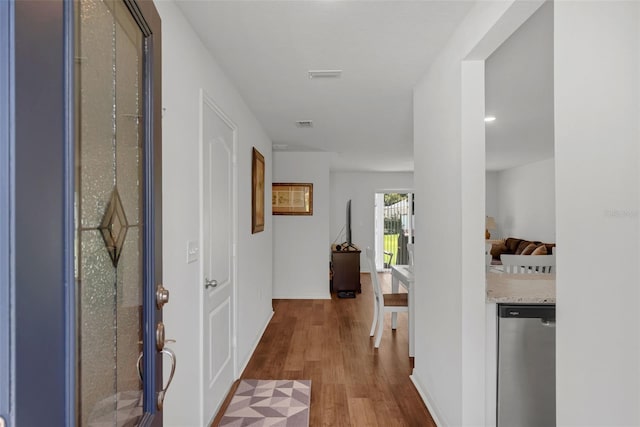 69 Pin Oak Dr, Palm Coast, FL 32164 - corridor with wood finished floors and baseboards