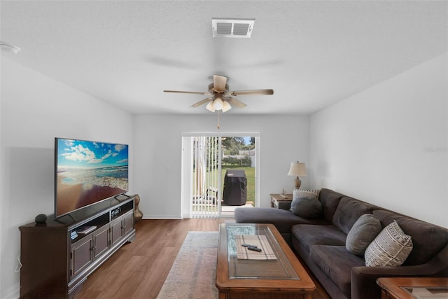 69 Pin Oak Dr, Palm Coast, FL 32164 - living room with ceiling fan and light wood finished floors