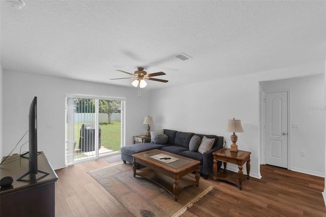 69 Pin Oak Dr, Palm Coast, FL 32164 - living room featuring a ceiling fan and wood finished floors