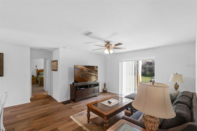 69 Pin Oak Dr, Palm Coast, FL 32164 - living room featuring ceiling fan and wood finished floors
