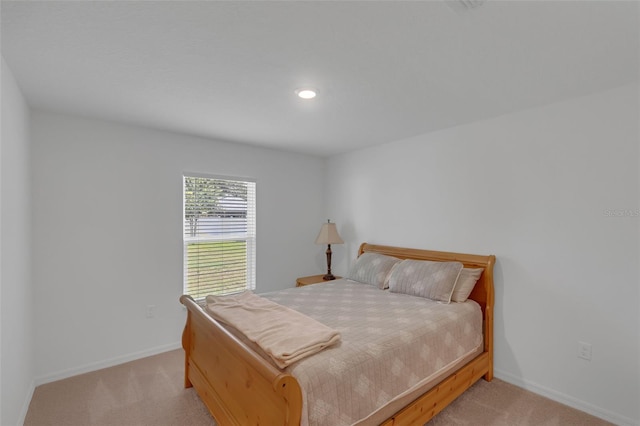 69 Pin Oak Dr, Palm Coast, FL 32164 - bedroom featuring light colored carpet and recessed lighting