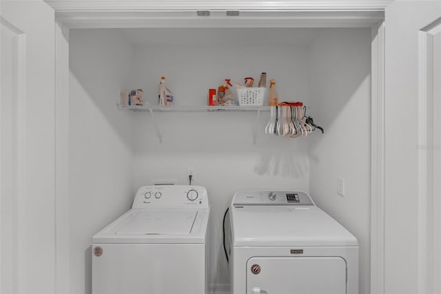 69 Pin Oak Dr, Palm Coast, FL 32164 - washroom with washing machine and clothes dryer