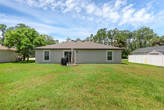 69 Pin Oak Dr, Palm Coast, FL 32164 - back of property featuring stucco siding