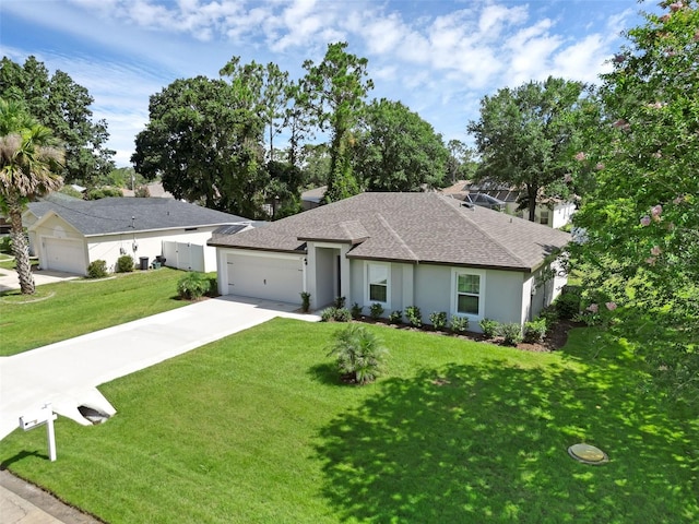 69 Pin Oak Dr, Palm Coast, FL 32164 - ranch-style house featuring a shingled roof, an attached garage, a front yard, concrete driveway, and stucco siding